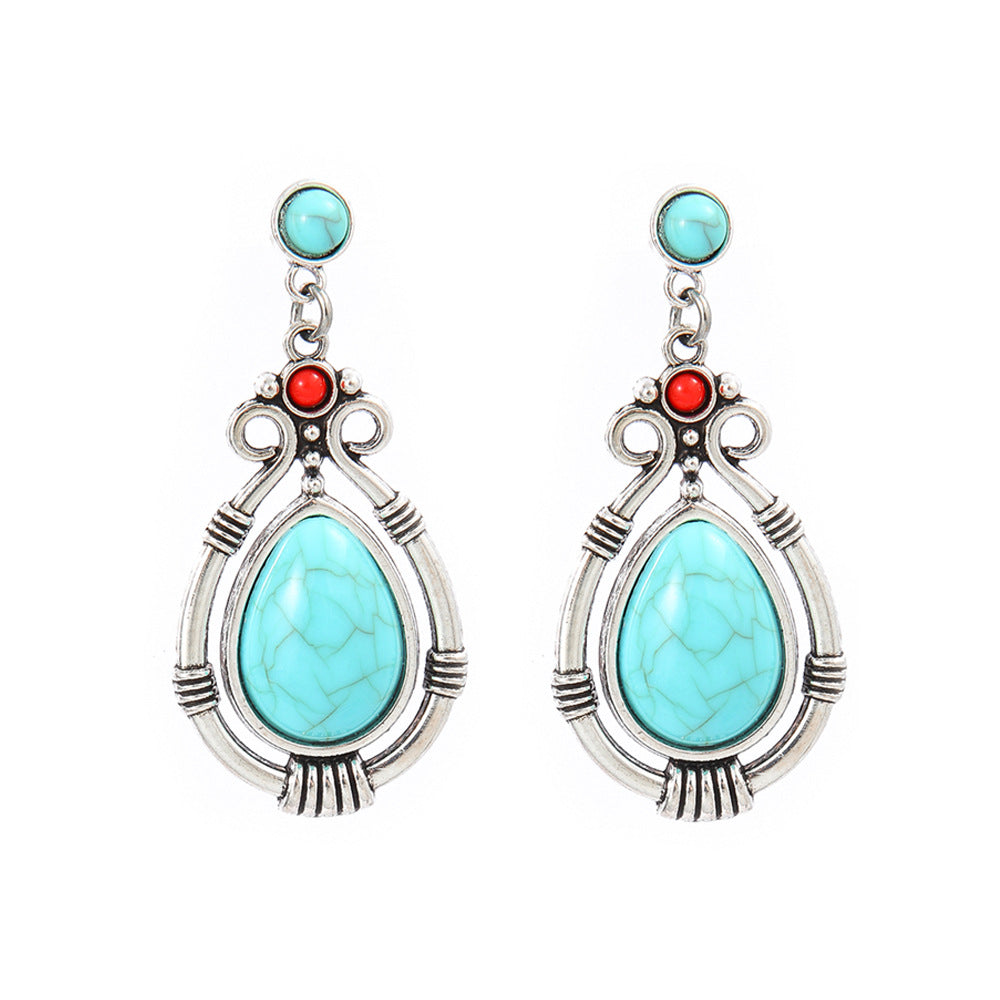 Turquoise Tassel Earrings with Geometric Metal Design