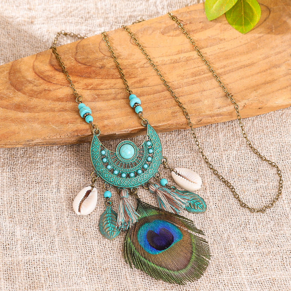 Fashionable Long Pendant Necklace with Geometric Design and Peacock Feather
