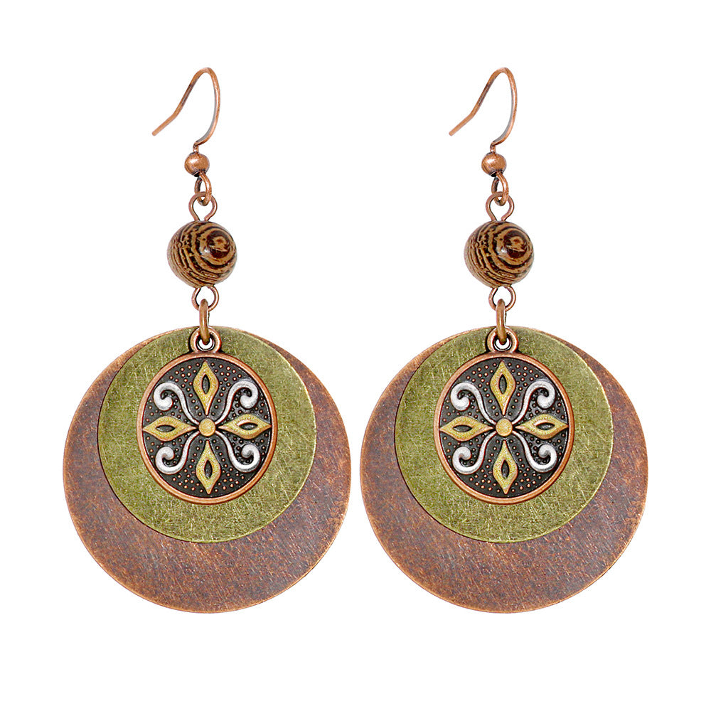 Bohemian Vintage Inspired Earrings with Feather and Tassel Elements