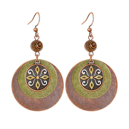 Bohemian Vintage Inspired Earrings with Feather and Tassel Elements