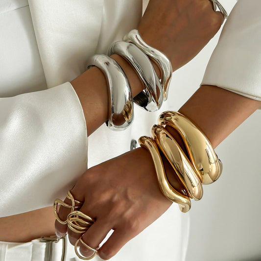 Trendy Metal Open-Cuff Bracelet With Spring Design