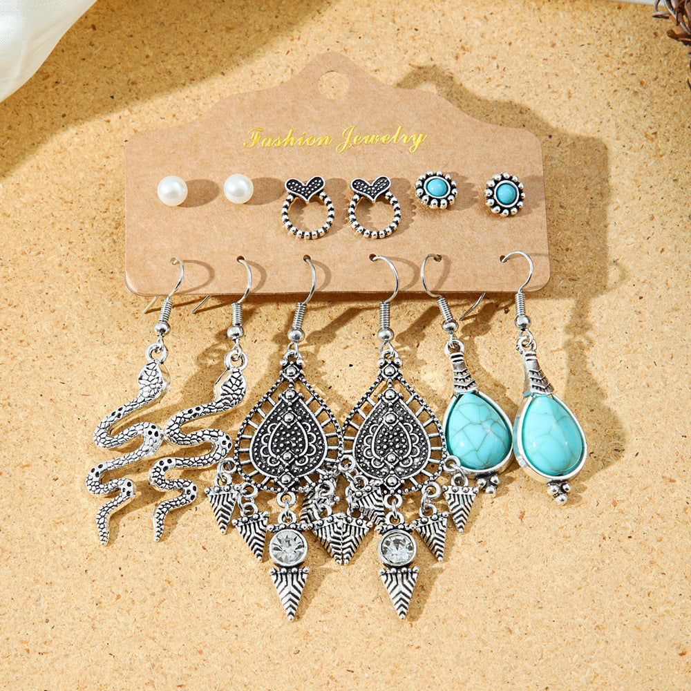 Bohemian Style Metal Earrings with Tassels and Geometric Shapes