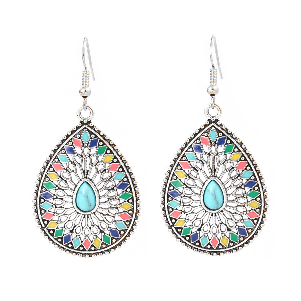 Turquoise Tassel Earrings with Geometric Metal Design
