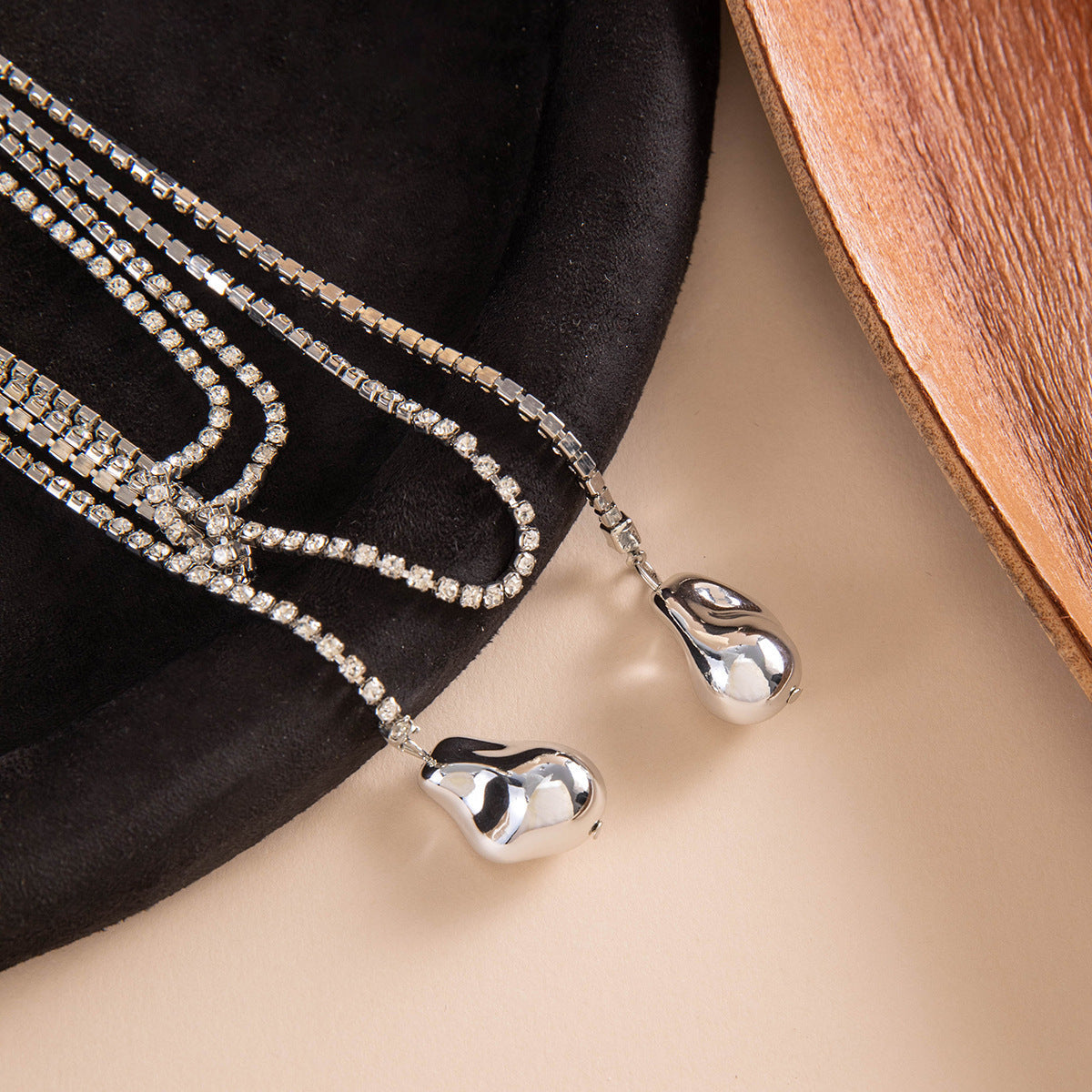 Long Layered Necklace With Diamond Accents And Geometric Pendants