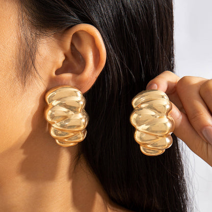 Geometric Gold Drop Earrings With Twisted Design