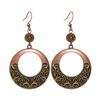 Bohemian Vintage Inspired Earrings with Feather and Tassel Elements