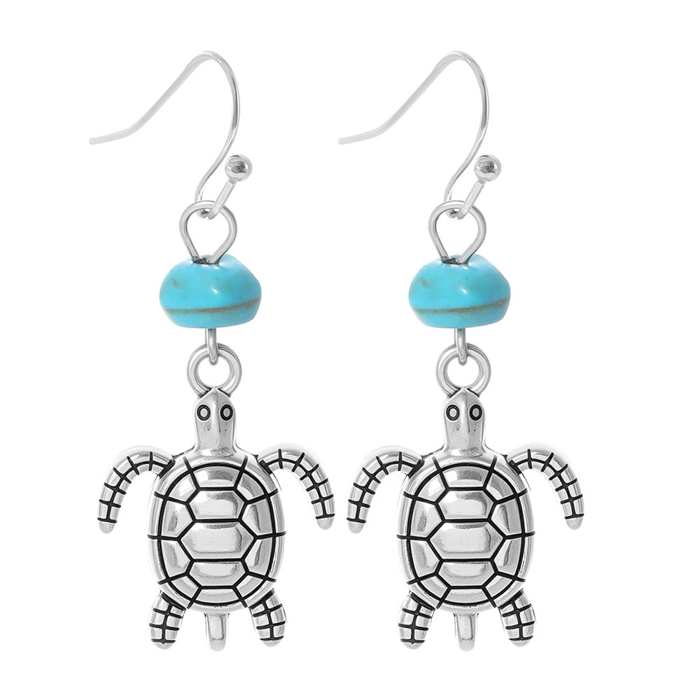 Turquoise Tassel Earrings with Geometric Metal Design