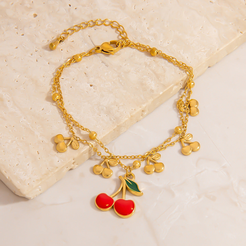 Stainless Steel Pearl Bracelet With Cherry And Bee Pendant