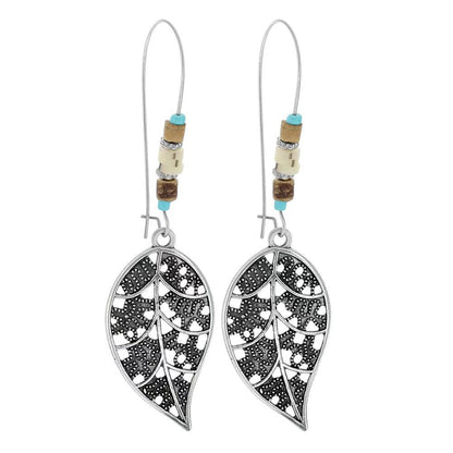 Turquoise Tassel Earrings with Geometric Metal Design