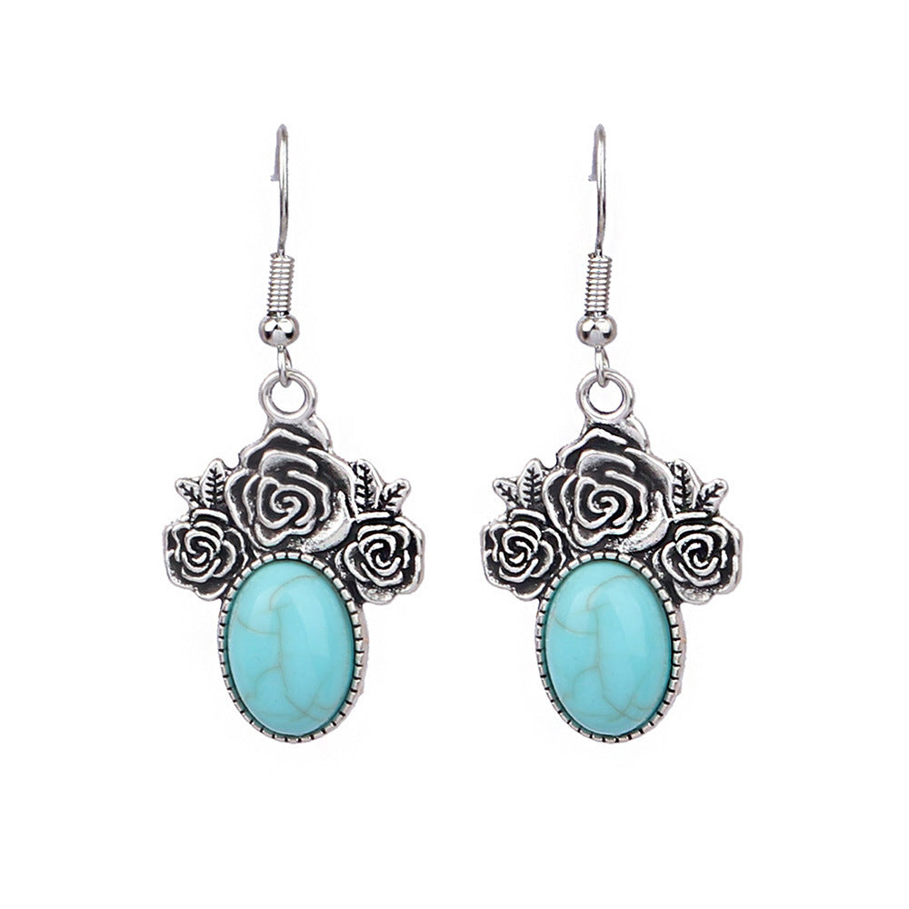 Turquoise Tassel Earrings with Geometric Metal Design