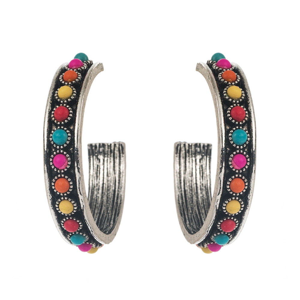 Exaggerated C-Shaped Earrings with Turquoise Accent