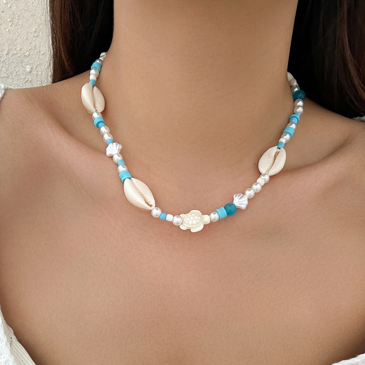 Ocean Breeze Bead Necklace With Starfish And Shell Design