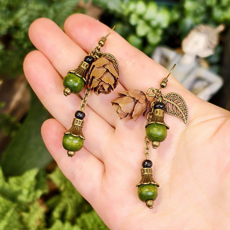 Bohemian Floral-Inspired Alloy Earrings with Unique Wood Bead Design