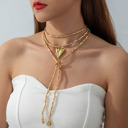 Long Layered Necklace With Diamond Accents And Geometric Pendants