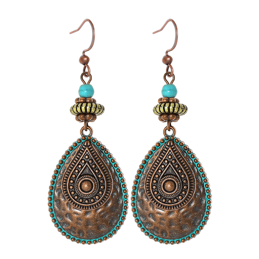 Bohemian Vintage Inspired Earrings with Feather and Tassel Elements