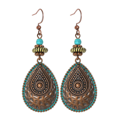 Bohemian Vintage Inspired Earrings with Feather and Tassel Elements
