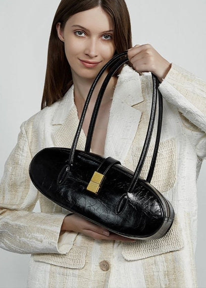 Oval Patent Leather Top Handle Structured Handbag