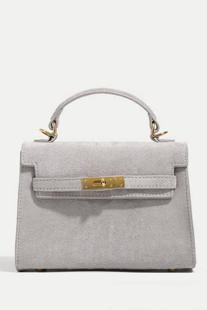 Suede metal clasp handbag Kelly bag
