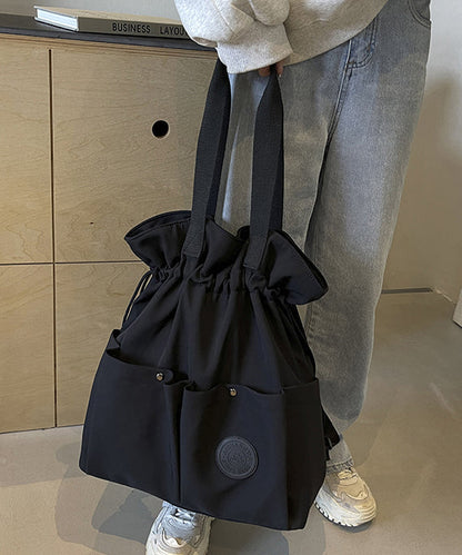 Stylish Black Pockets Drawstring Canvas Satchel Handbag