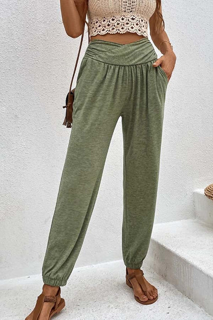 Temperament casual loose pocket high waist trousers