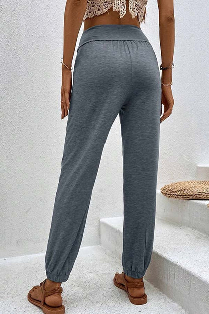 Temperament casual loose pocket high waist trousers