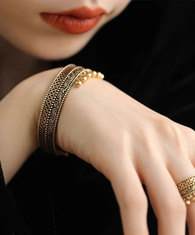 Vintage Ancient Gold Hollow Out Patchwork Tassel Cuff