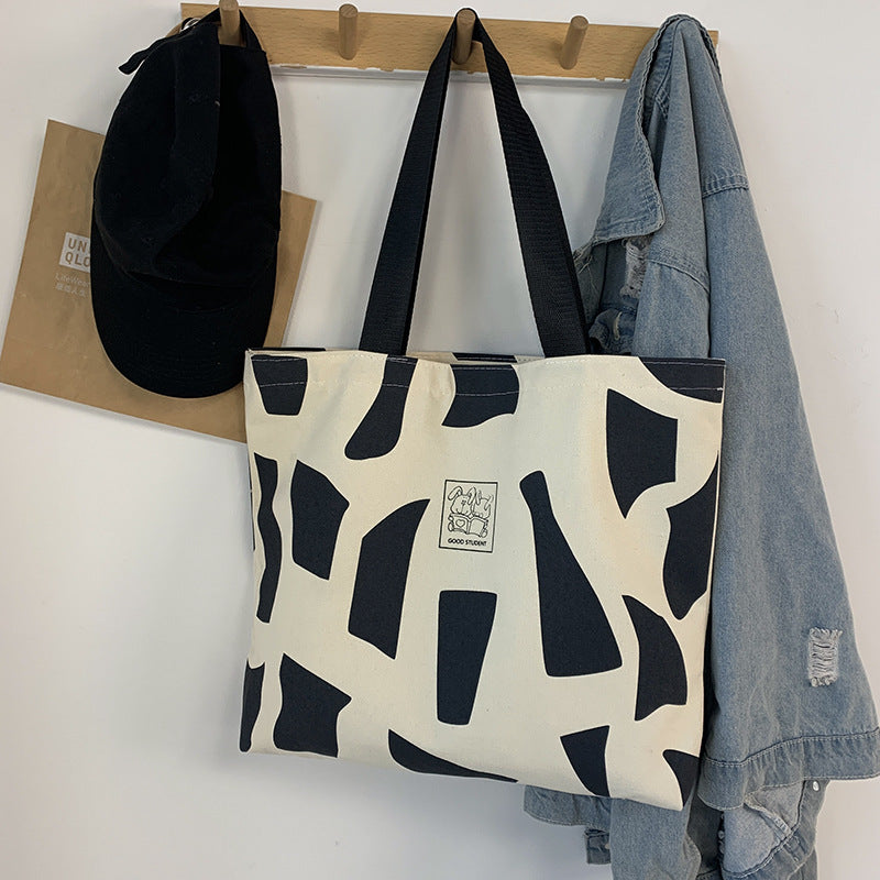 Zippered Canvas Handbag With Artistic Design