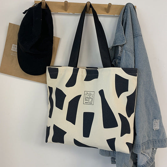 Zippered Canvas Handbag With Artistic Design